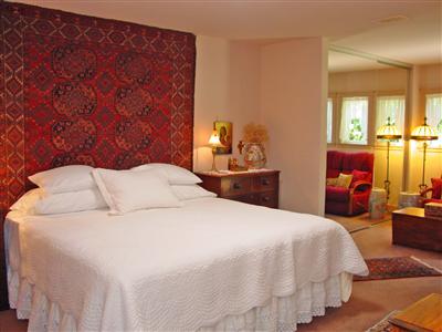 1853 Meiners Road Ojai, CA 93023 - Photo 4 of 9 a bedroom with a bed and wooden floor