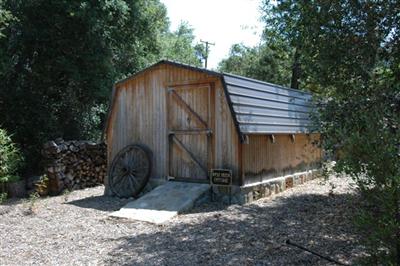 1853 Meiners Road Ojai, CA 93023 - Photo 8 of 9 a backyard of a house with a table and chairs