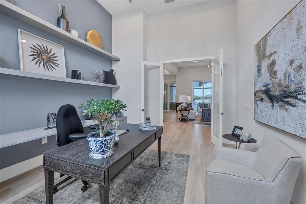 8477 Pavia Way Lakewood Ranch, FL 34202 - Photo 13 of 67 a living room with furniture and wooden floor