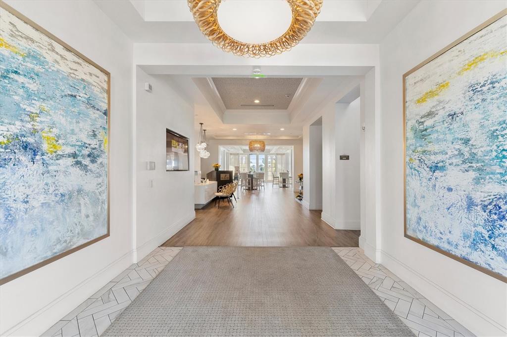 8477 Pavia Way Lakewood Ranch, FL 34202 - Photo 54 of 67 a view interior of a house with wooden floor and living room
