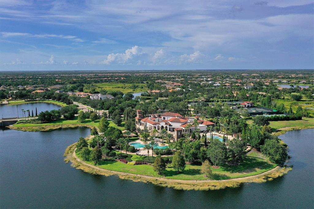 8477 Pavia Way Lakewood Ranch, FL 34202 - Photo 67 of 67 a view of a lake with a house