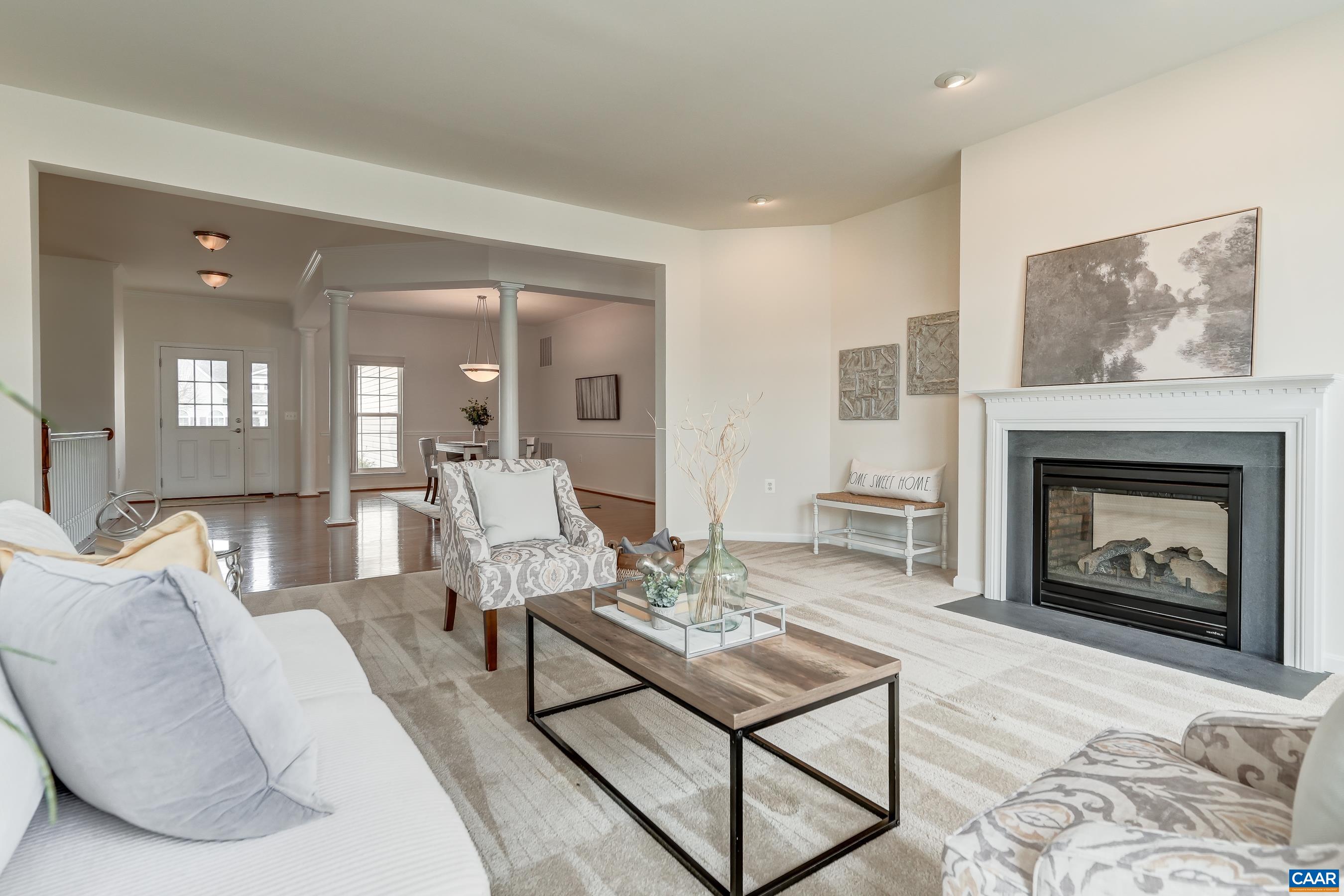 65 Prestwood Drive Ruckersville, VA 22968 - Photo 15 of 61 a living room with furniture and a fireplace