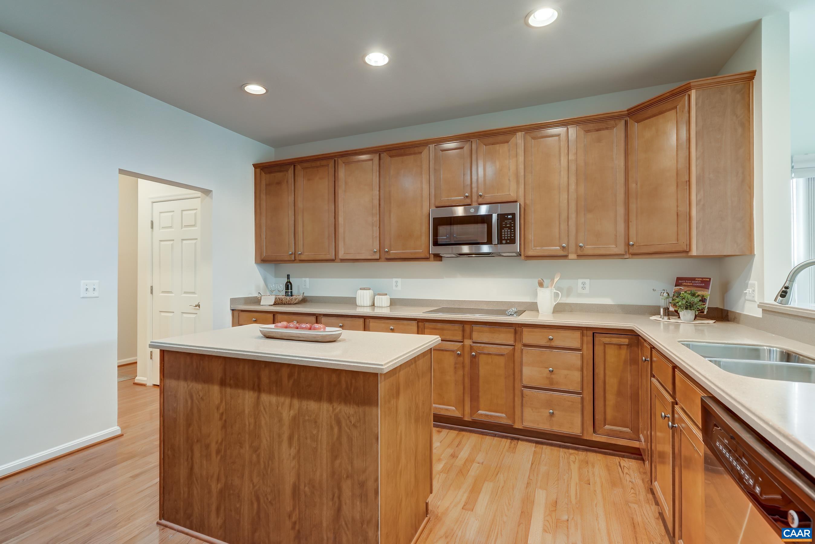 65 Prestwood Drive Ruckersville, VA 22968 - Photo 17 of 61 a kitchen with stainless steel appliances granite countertop a sink stove and cabinets