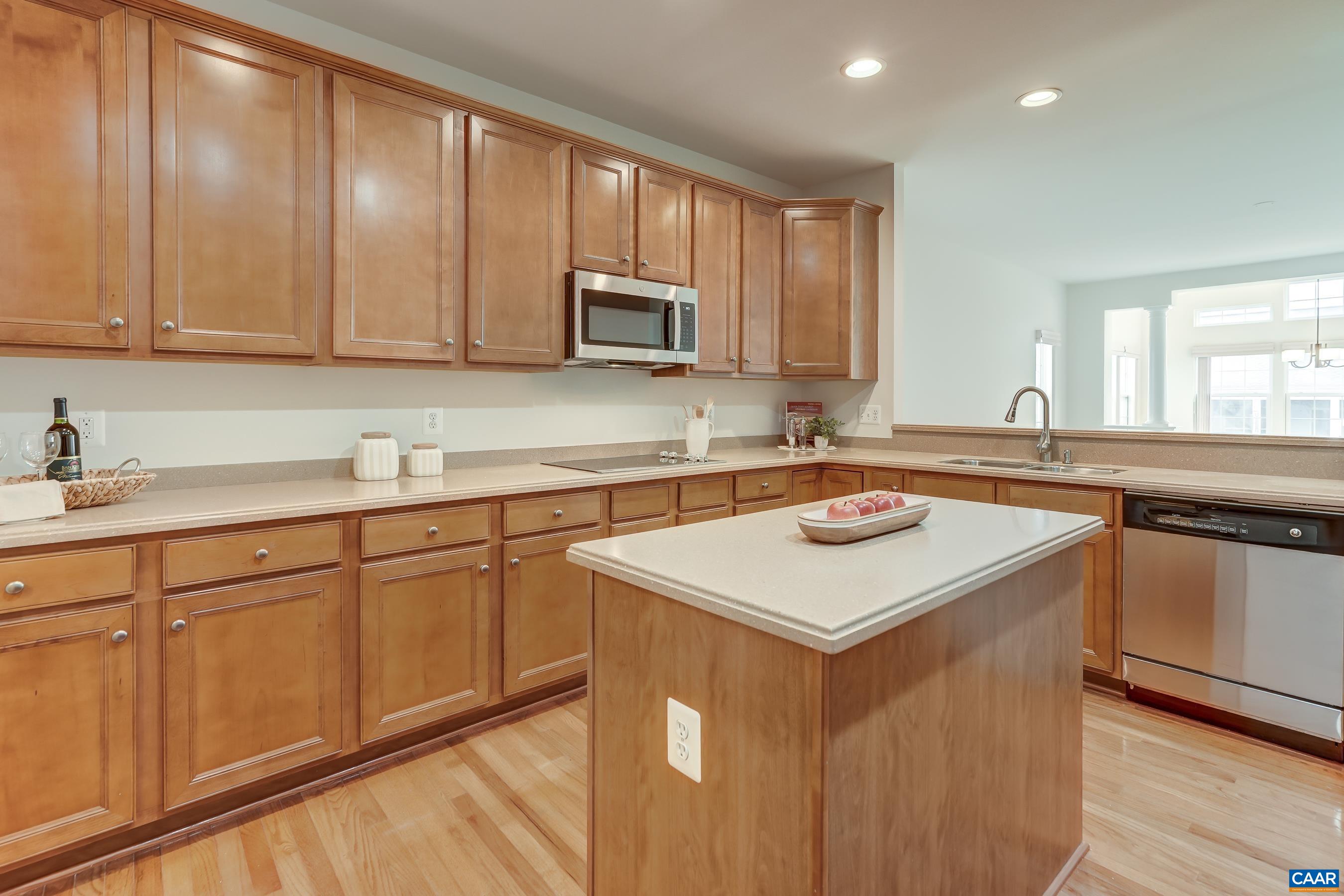 65 Prestwood Drive Ruckersville, VA 22968 - Photo 18 of 61 a kitchen with stainless steel appliances granite countertop a sink a stove and a refrigerator