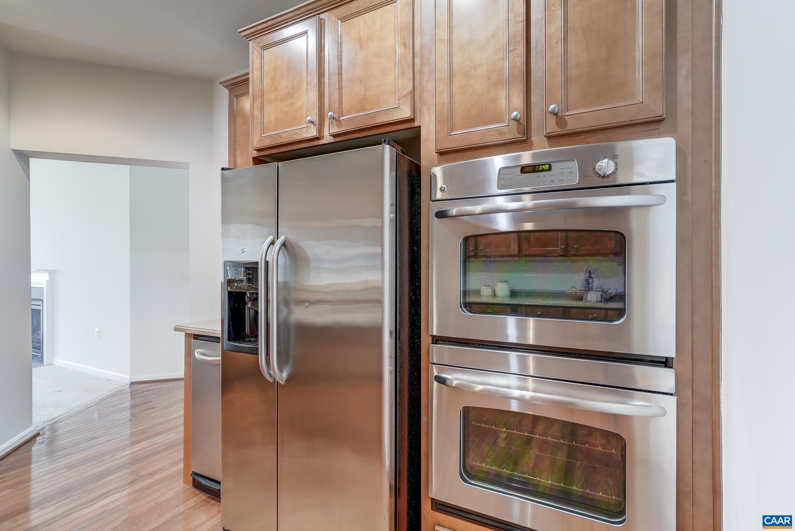 65 Prestwood Drive Ruckersville, VA 22968 - Photo 22 of 61 a metallic refrigerator freezer and a stove top oven
