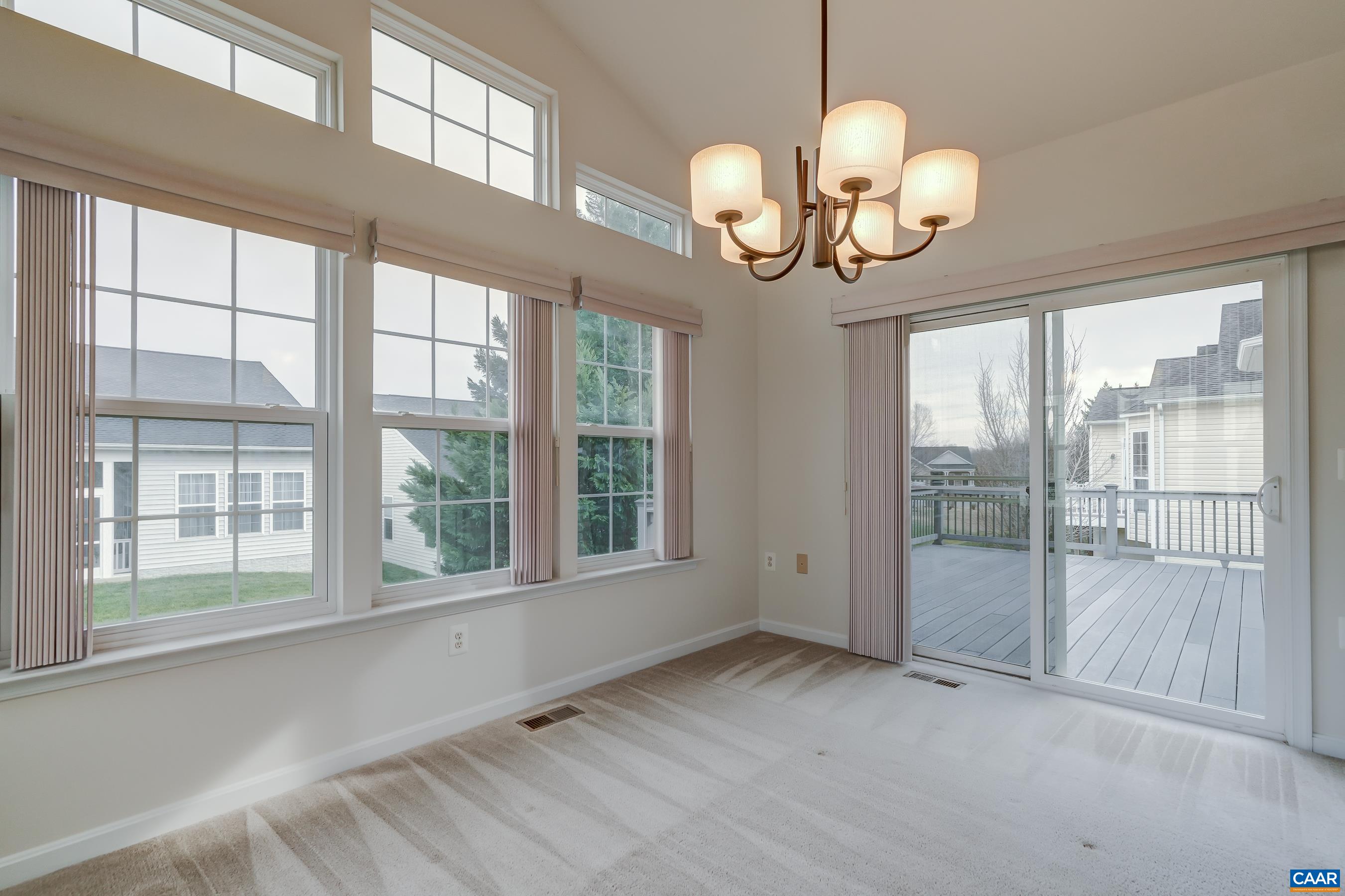 65 Prestwood Drive Ruckersville, VA 22968 - Photo 25 of 61 a view of an empty room with wooden floor and a window