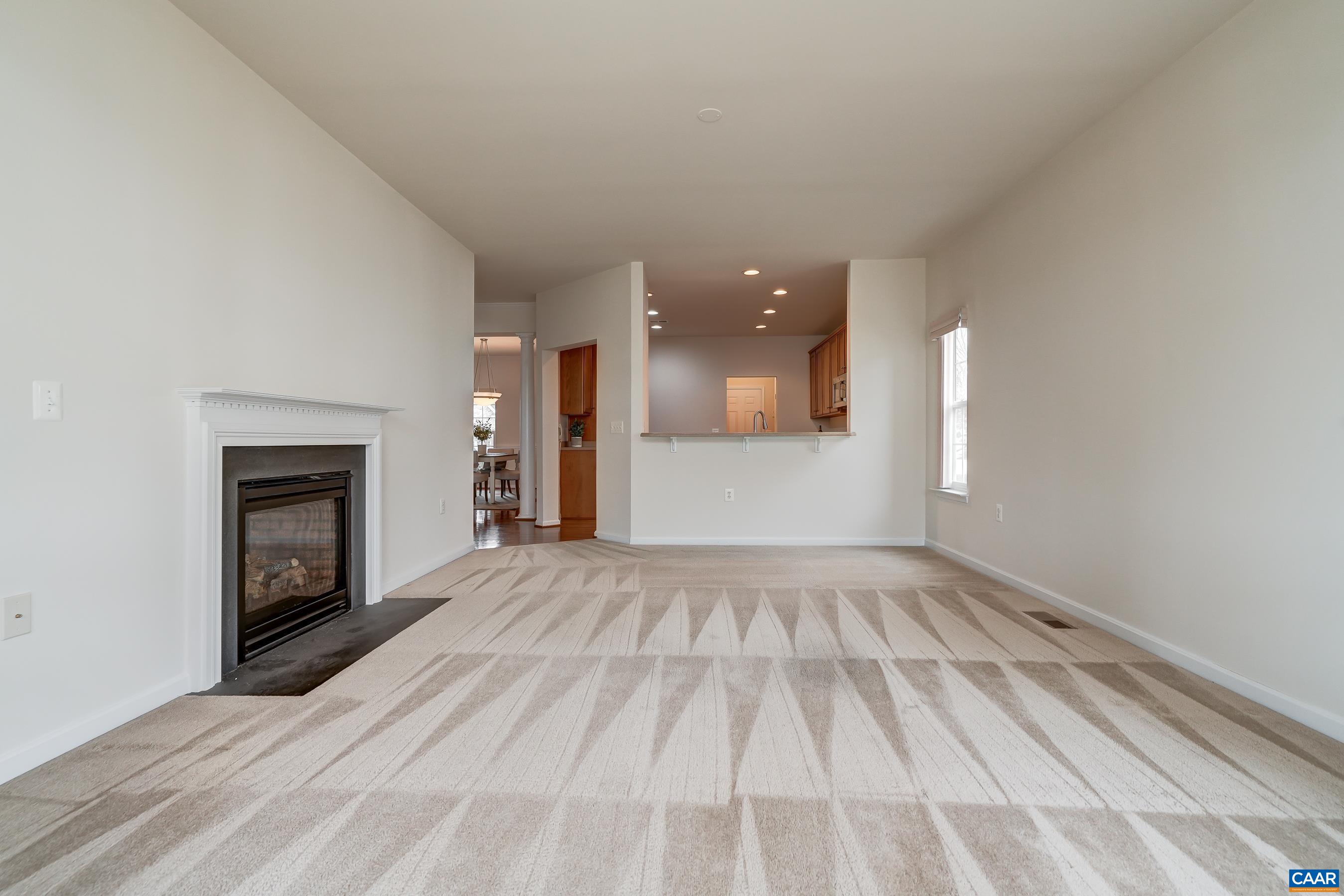 65 Prestwood Drive Ruckersville, VA 22968 - Photo 27 of 61 a view of empty room with a fireplace