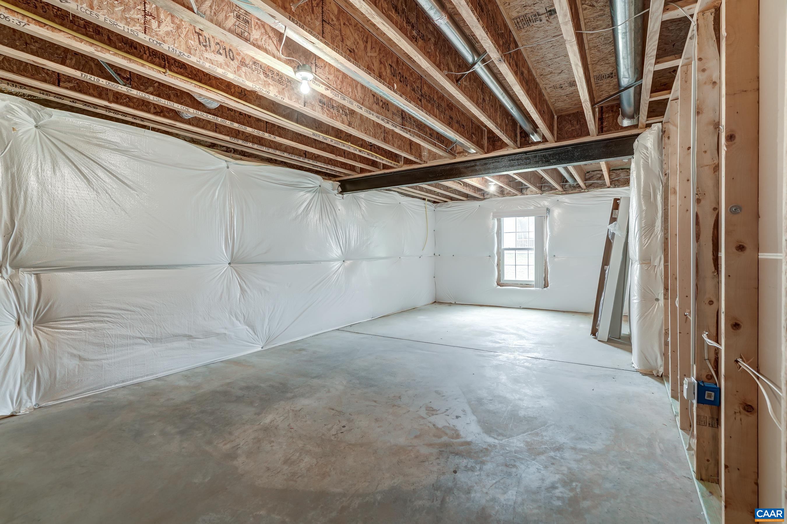 65 Prestwood Drive Ruckersville, VA 22968 - Photo 49 of 61 Unfinished spaces in the basement provide storage or room for future growth.