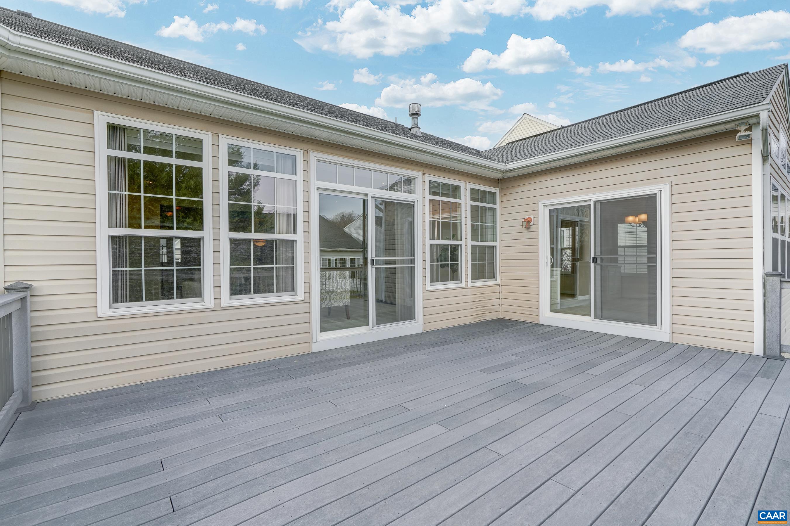 65 Prestwood Drive Ruckersville, VA 22968 - Photo 61 of 61 a view of house with deck and floor to ceiling windows