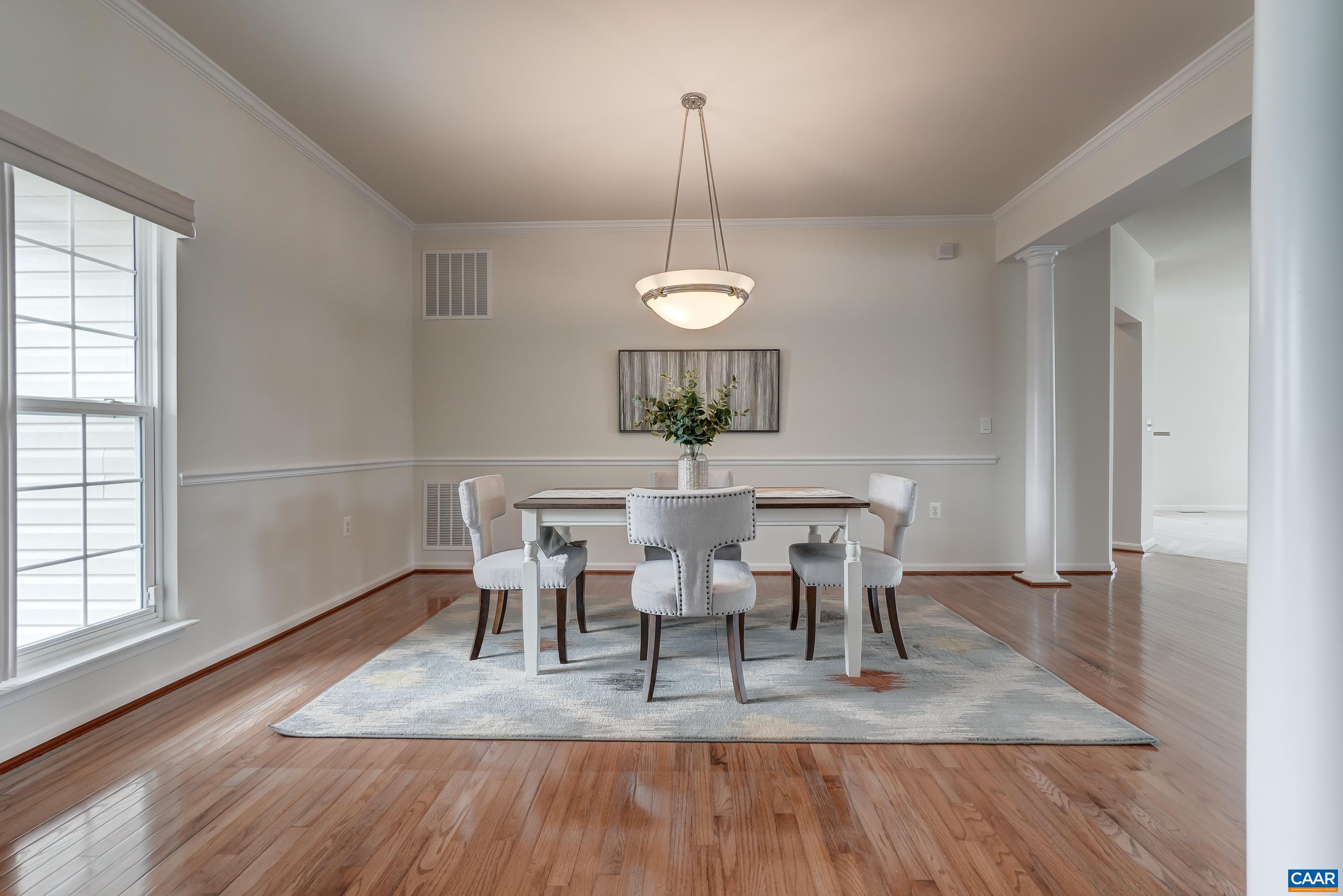 65 Prestwood Drive Ruckersville, VA 22968 - Photo 8 of 61 a view of a dining room with furniture window and wooden floor