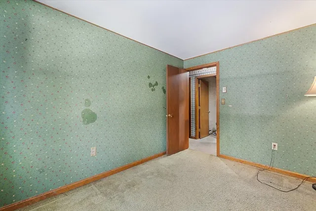 a view of a room with an empty space