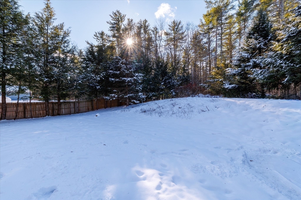 690 Clark Street Gardner, MA 01440 - Photo 19 of 26 a view of a field with trees in the background