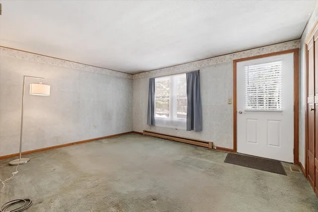 an empty room with windows