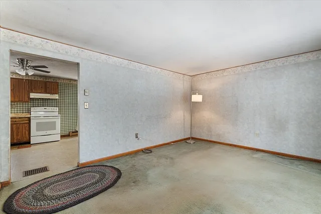 a view of a livingroom with a staircase