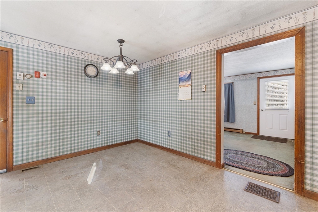 690 Clark Street Gardner, MA 01440 - Photo 8 of 26 a view of a livingroom with an empty space