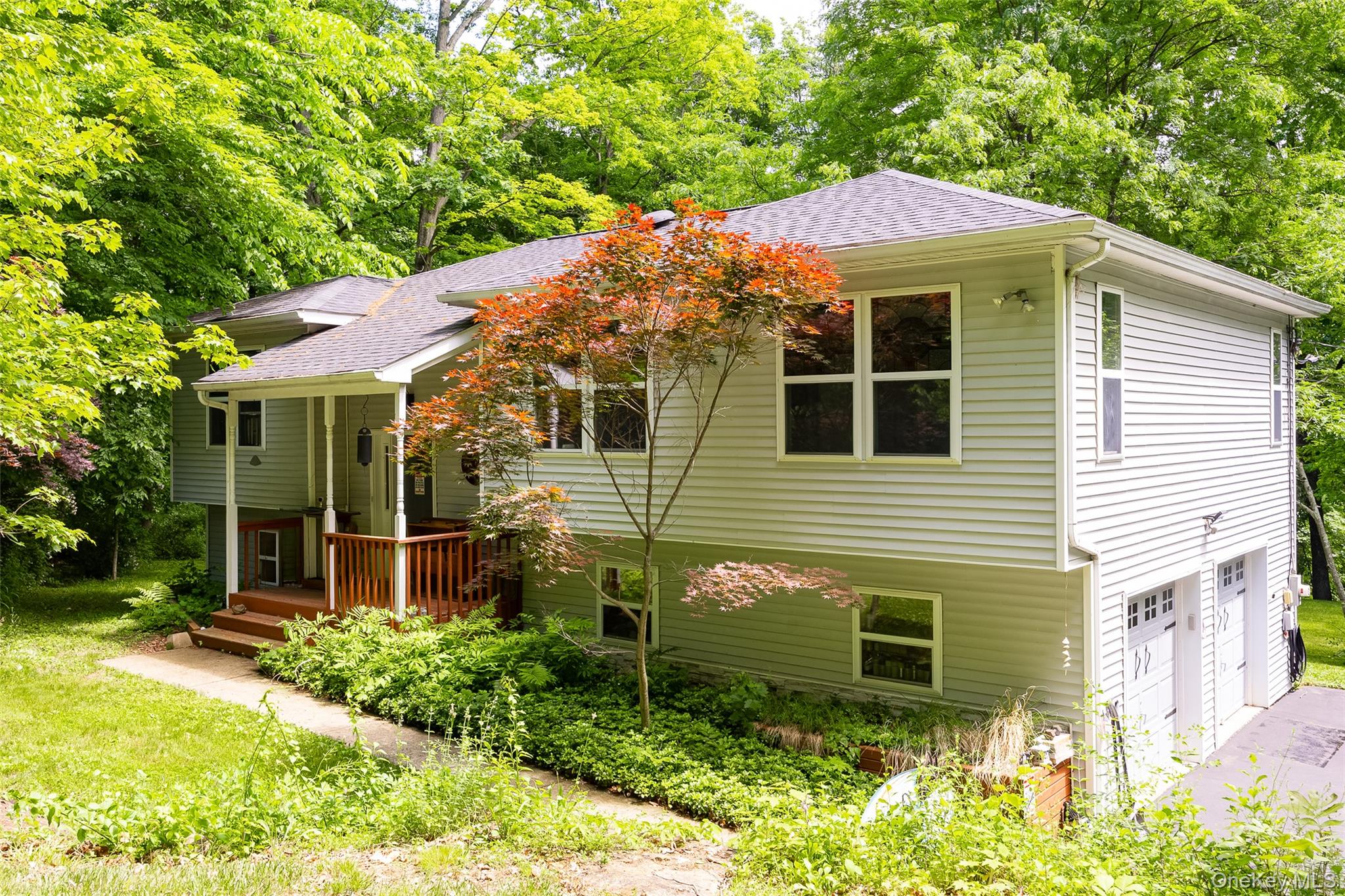 164 Bohl Road Hopewell Junction, NY 12533 - Photo 1 of 30 a front view of a house with garden