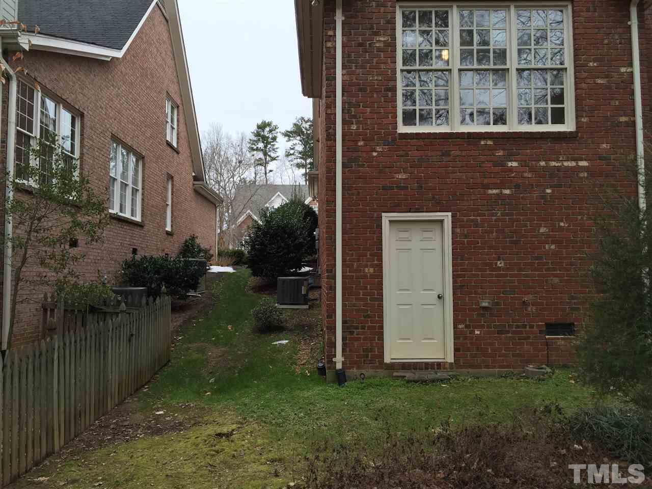 127 Yorkchester Way Raleigh, NC 27615 - Photo 22 of 25 a backyard of a house with lots of green space
