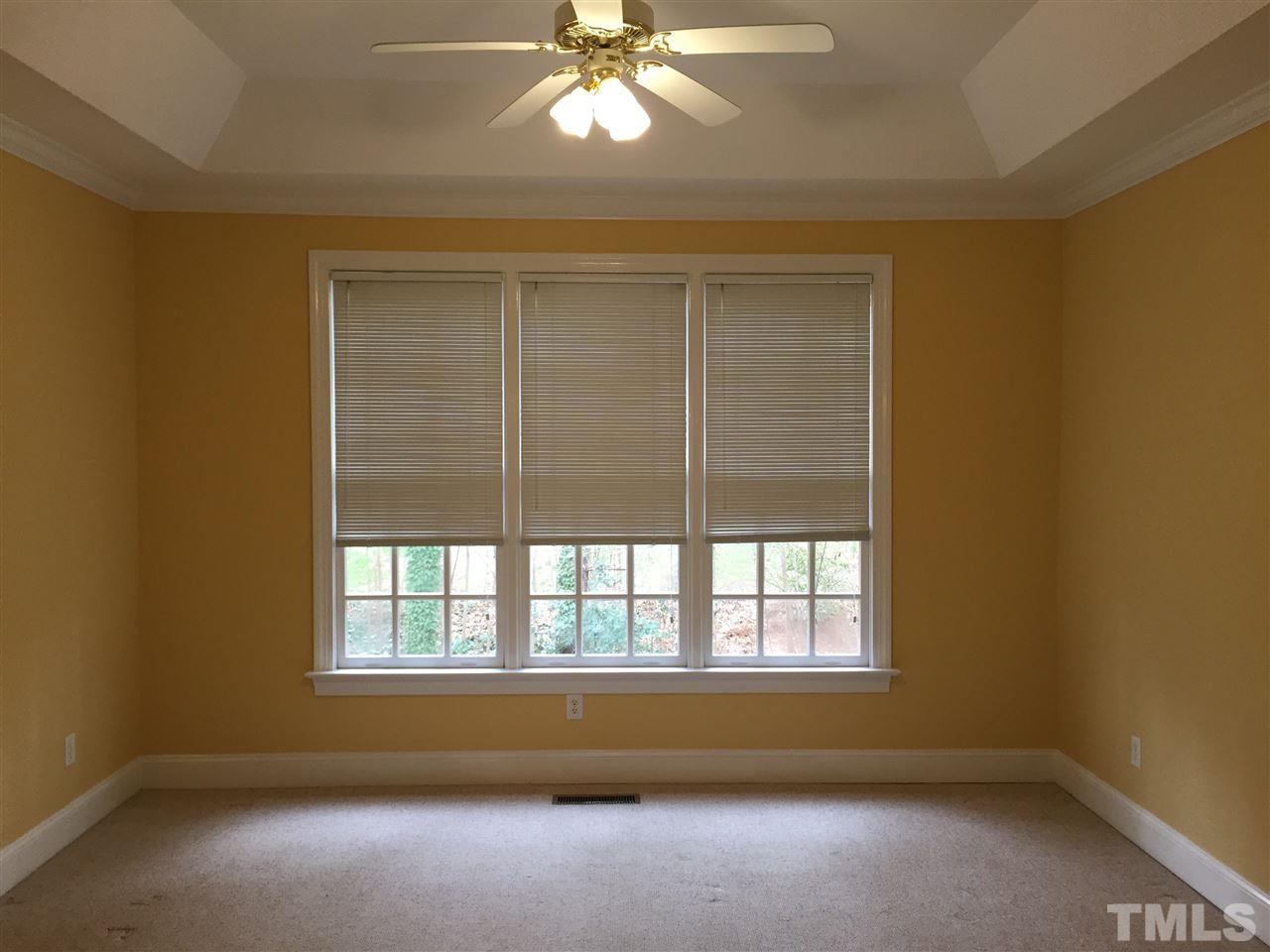 127 Yorkchester Way Raleigh, NC 27615 - Photo 7 of 25 a view of room with window and ceiling fan