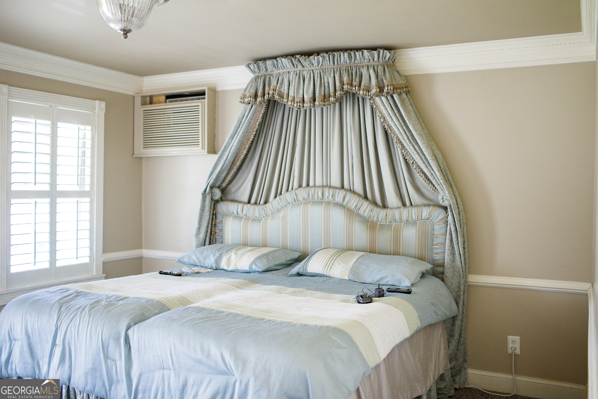 2110 Ware Street Blackshear, GA 31516 - Photo 44 of 57 a bedroom with a bed and wooden floor