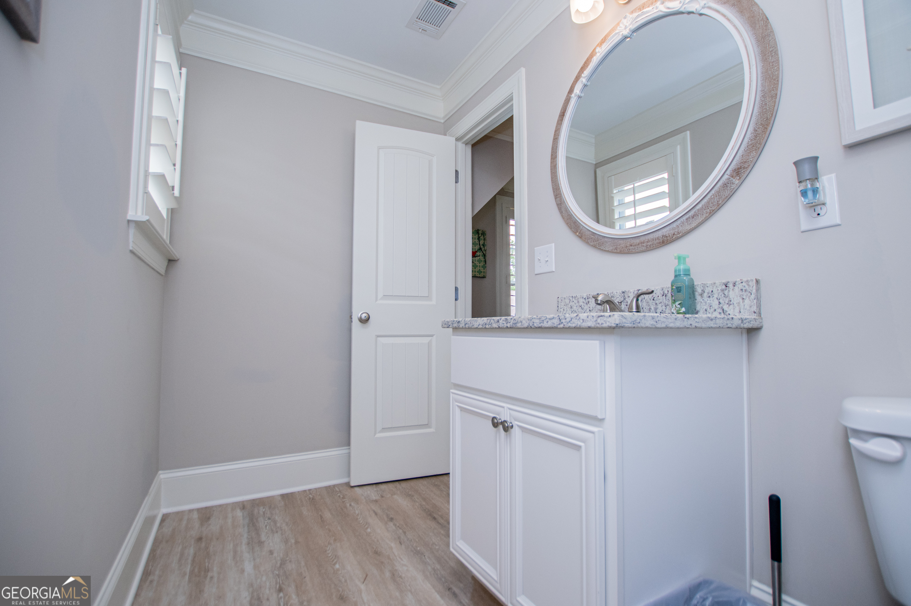 216 Yorkshire Lane Villa Rica, GA 30180 - Photo 61 of 94 a bathroom with a sink and a mirror