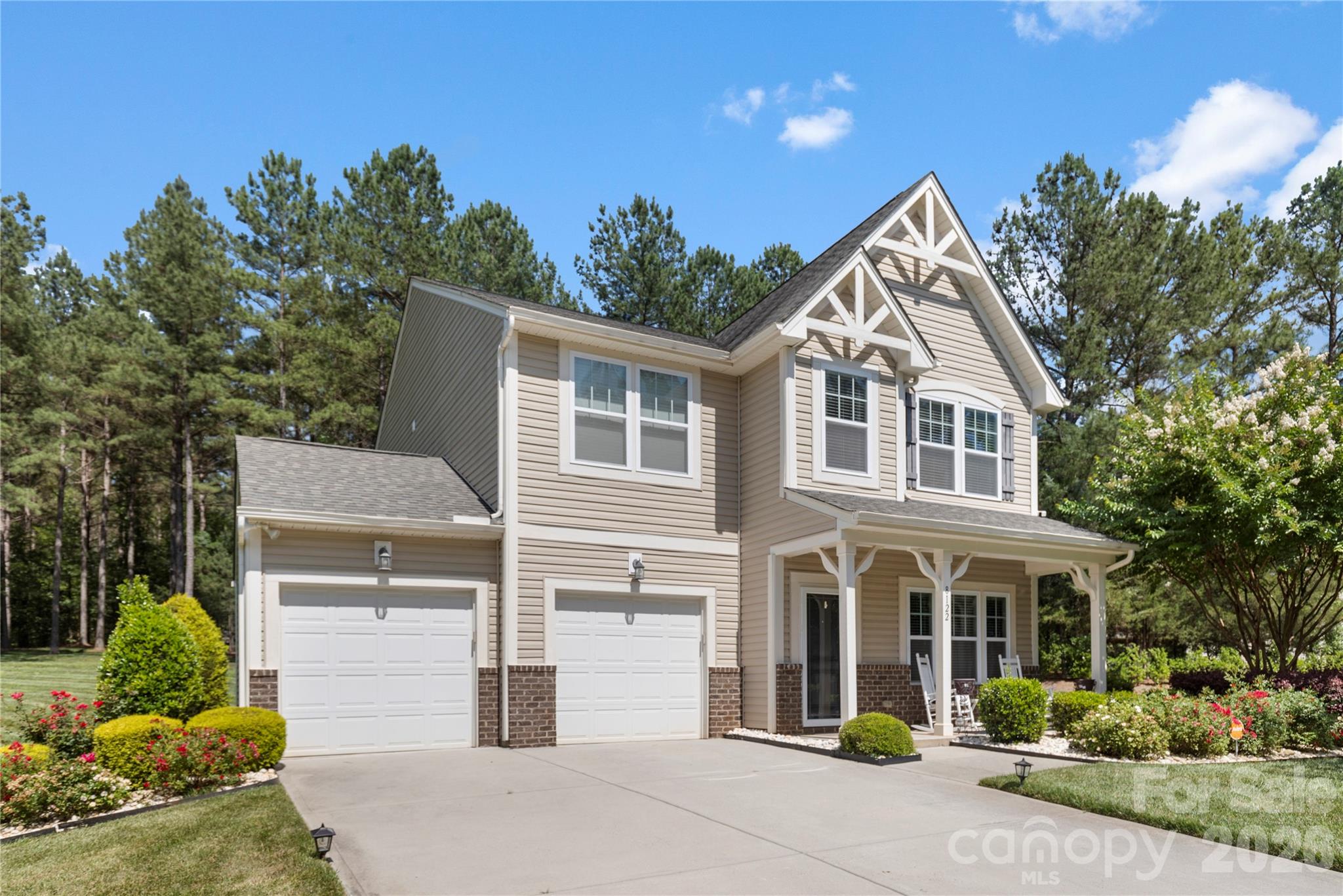8122 Mossy Rock Road Waxhaw, NC 28173 - Photo 28 of 28 a front view of a house with a yard