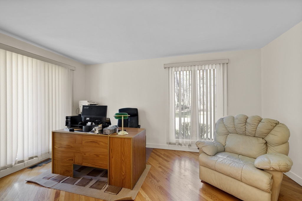 70 Cutters Ridge Road Carlisle, MA 01741 - Photo 12 of 36 a living room with furniture and a flat screen tv