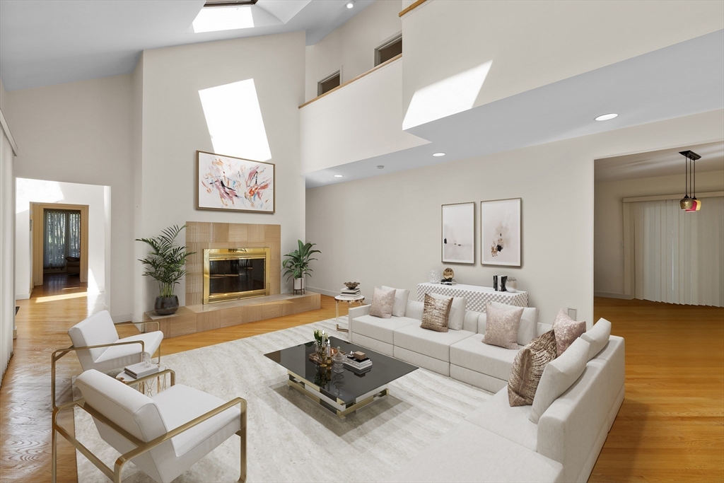 70 Cutters Ridge Road Carlisle, MA 01741 - Photo 2 of 36 a living room with furniture and a fireplace