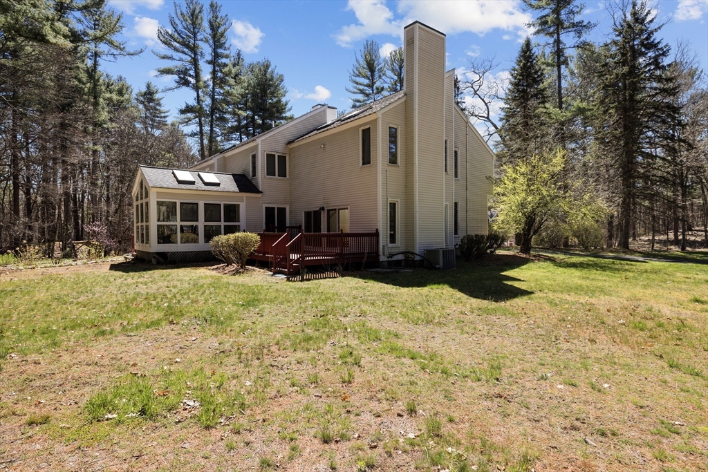 70 Cutters Ridge Road Carlisle, MA 01741 - Photo 30 of 36 a view of a house with backyard and trees