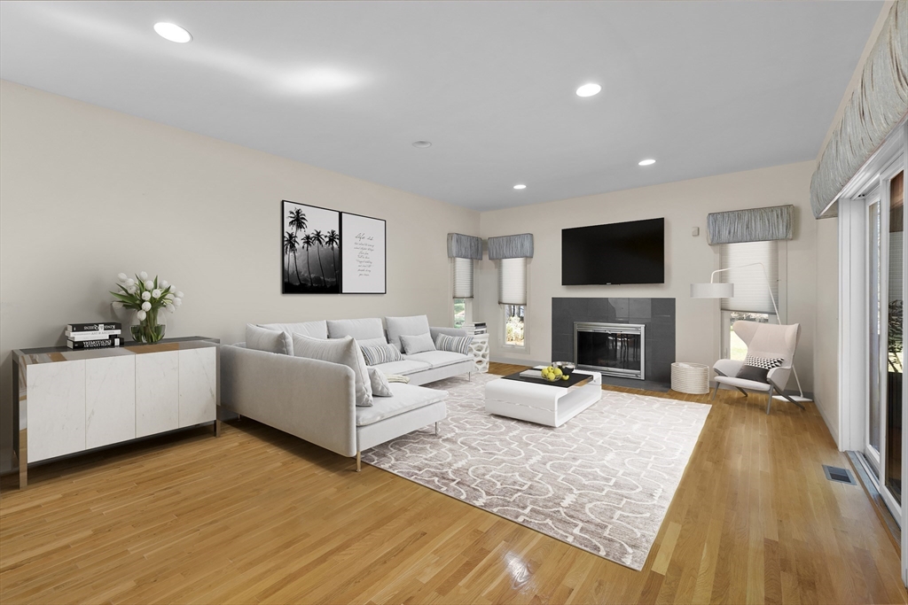 70 Cutters Ridge Road Carlisle, MA 01741 - Photo 3 of 36 a living room with furniture and a flat screen tv