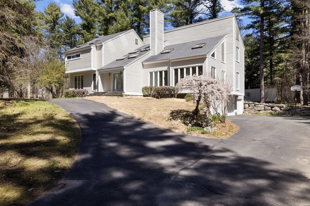 70 Cutters Ridge Road Carlisle, MA 01741 - Photo 35 of 36 a very nice looking house with a yard