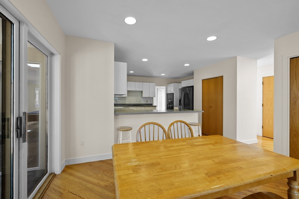 70 Cutters Ridge Road Carlisle, MA 01741 - Photo 8 of 36 a view of a kitchen with stainless steel appliances granite countertop a refrigerator and a sink