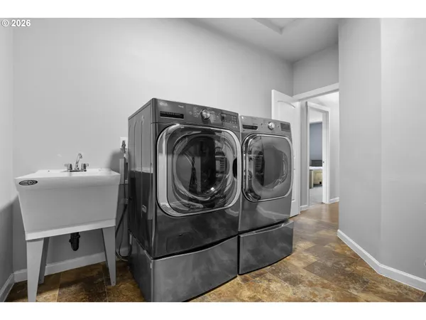 a utility room with dryer and washer