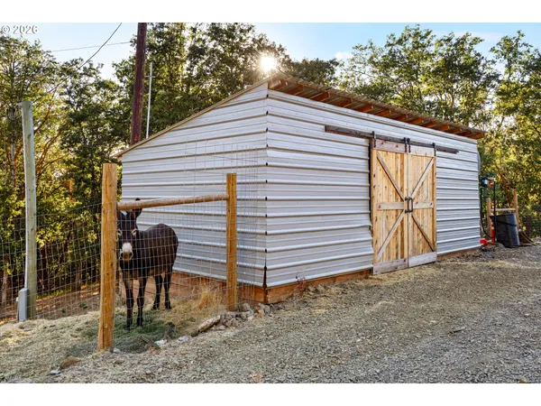 a view of a back yard of the house