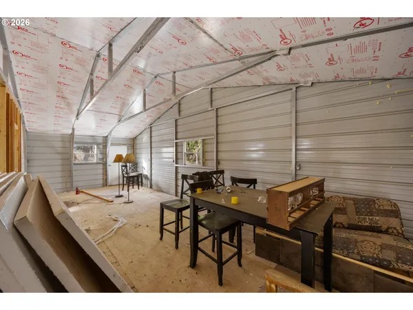 a view of a livingroom with furniture