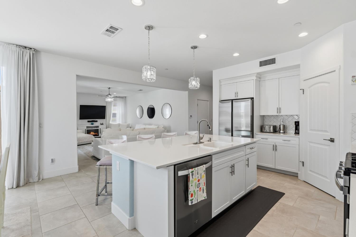 6326 West Richert Avenue Fresno, CA 93723 - Photo 9 of 45 a kitchen with a sink and cabinets