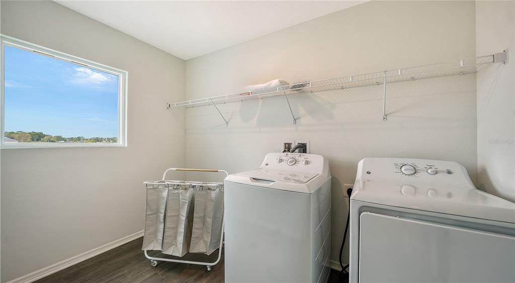 13113 Bayberry Way Parrish, FL 34219 - Photo 15 of 20 a utility room with dryer and washer