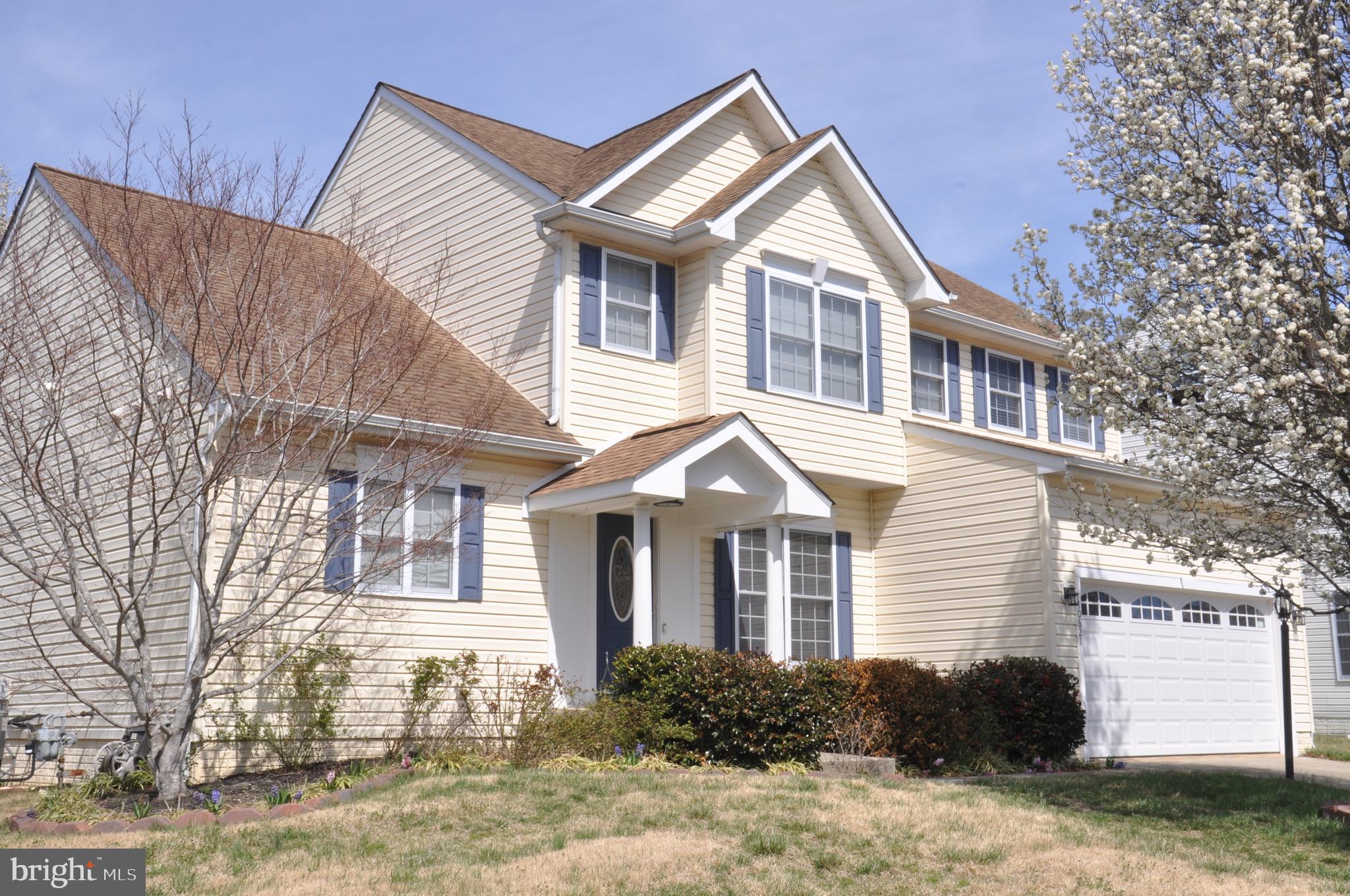 10621 Gallant Fox Way Ruther Glen, VA 22546 - Photo 2 of 65 a front view of a house with a yard