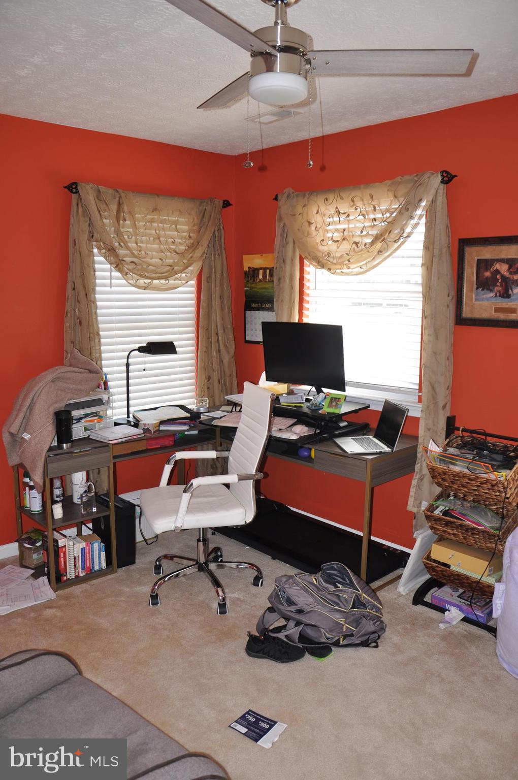 10621 Gallant Fox Way Ruther Glen, VA 22546 - Photo 43 of 65 a room with furniture and a window