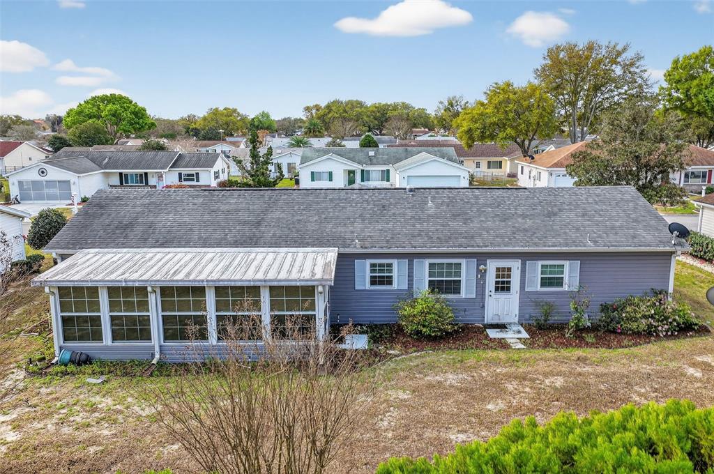 9398 Southeast 174th Loop Summerfield, FL 34491 - Photo 26 of 29 a view of a house with a yard