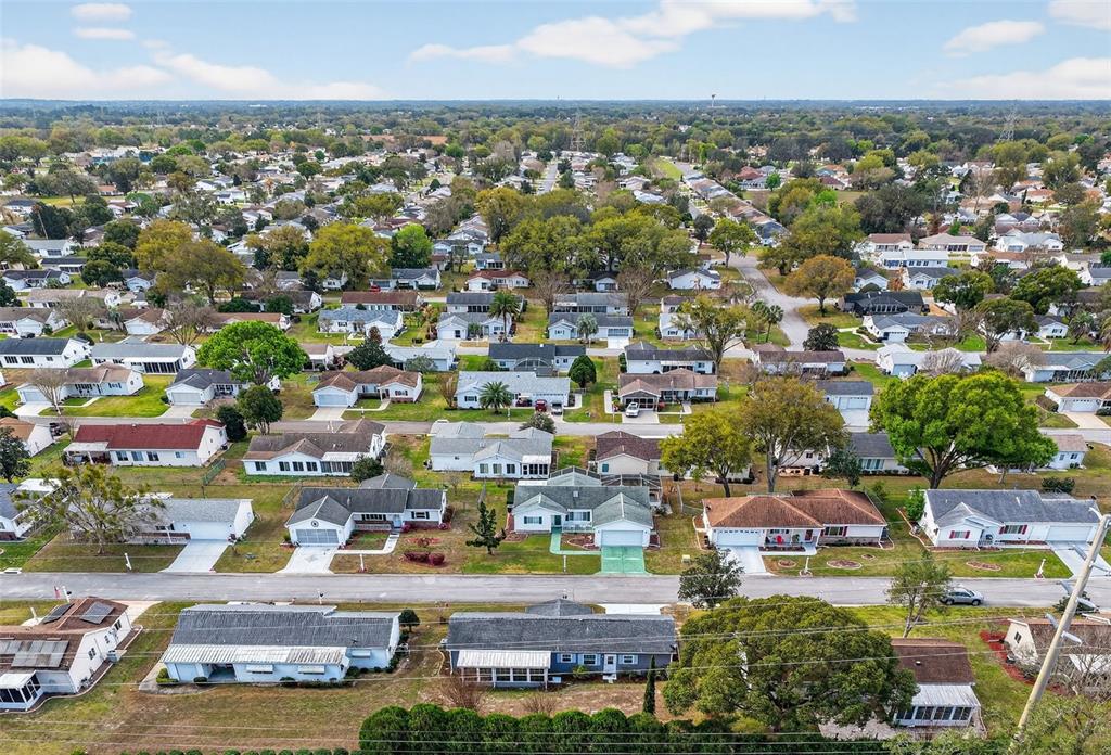 9398 Southeast 174th Loop Summerfield, FL 34491 - Photo 27 of 29 an aerial view of residential houses with city view