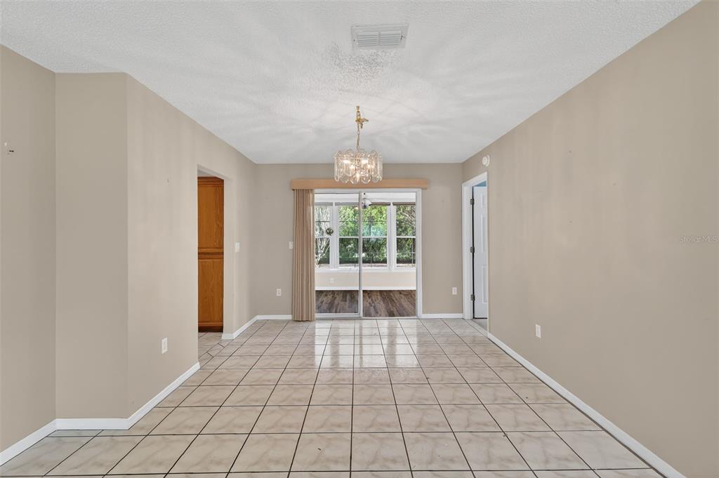 9398 Southeast 174th Loop Summerfield, FL 34491 - Photo 10 of 29 a view of an empty room with window