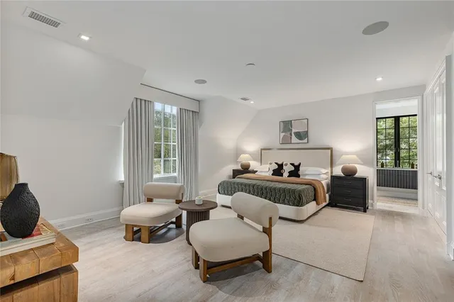 a bedroom with furniture and a couch