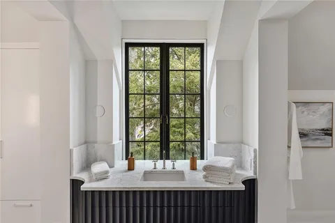 a room with furniture and a window