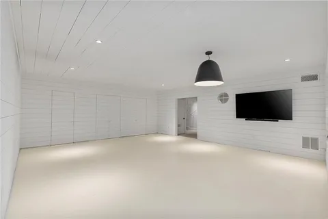 a view of a livingroom with a flat screen tv