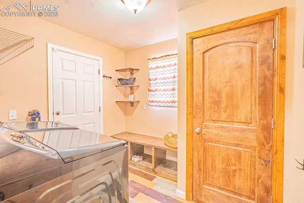 a living room with a granite countertop next to a window