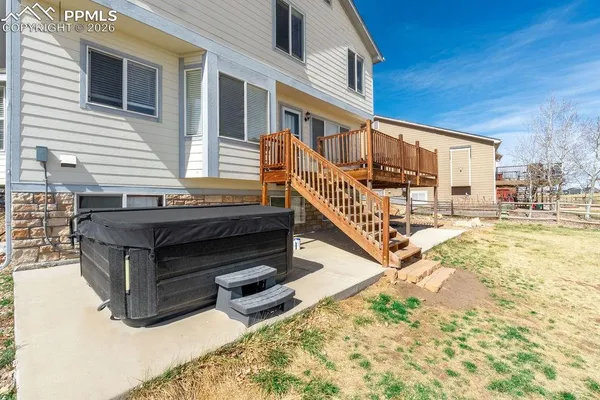 an aerial view of a house with a swimming pool