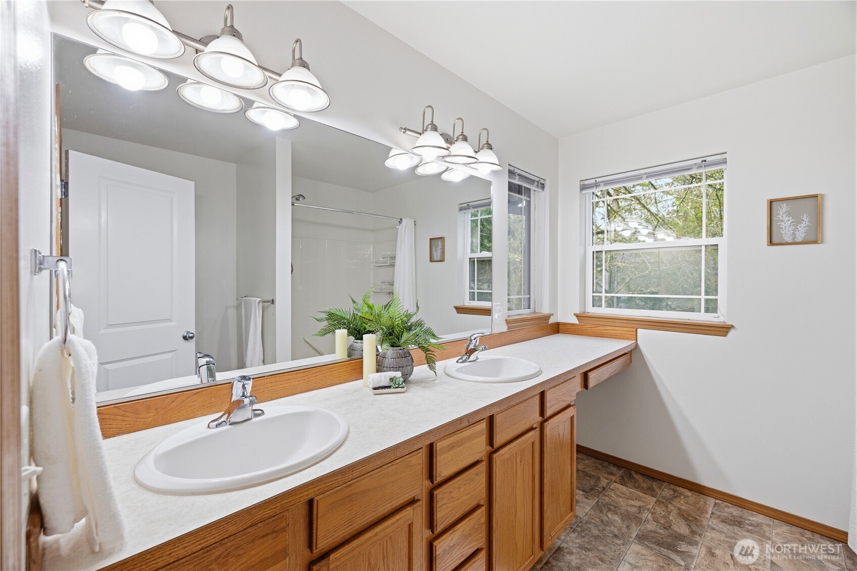 39 Sudden Valley Drive Bellingham, WA 98229 - Photo 15 of 40 a bathroom with a sink and a mirror