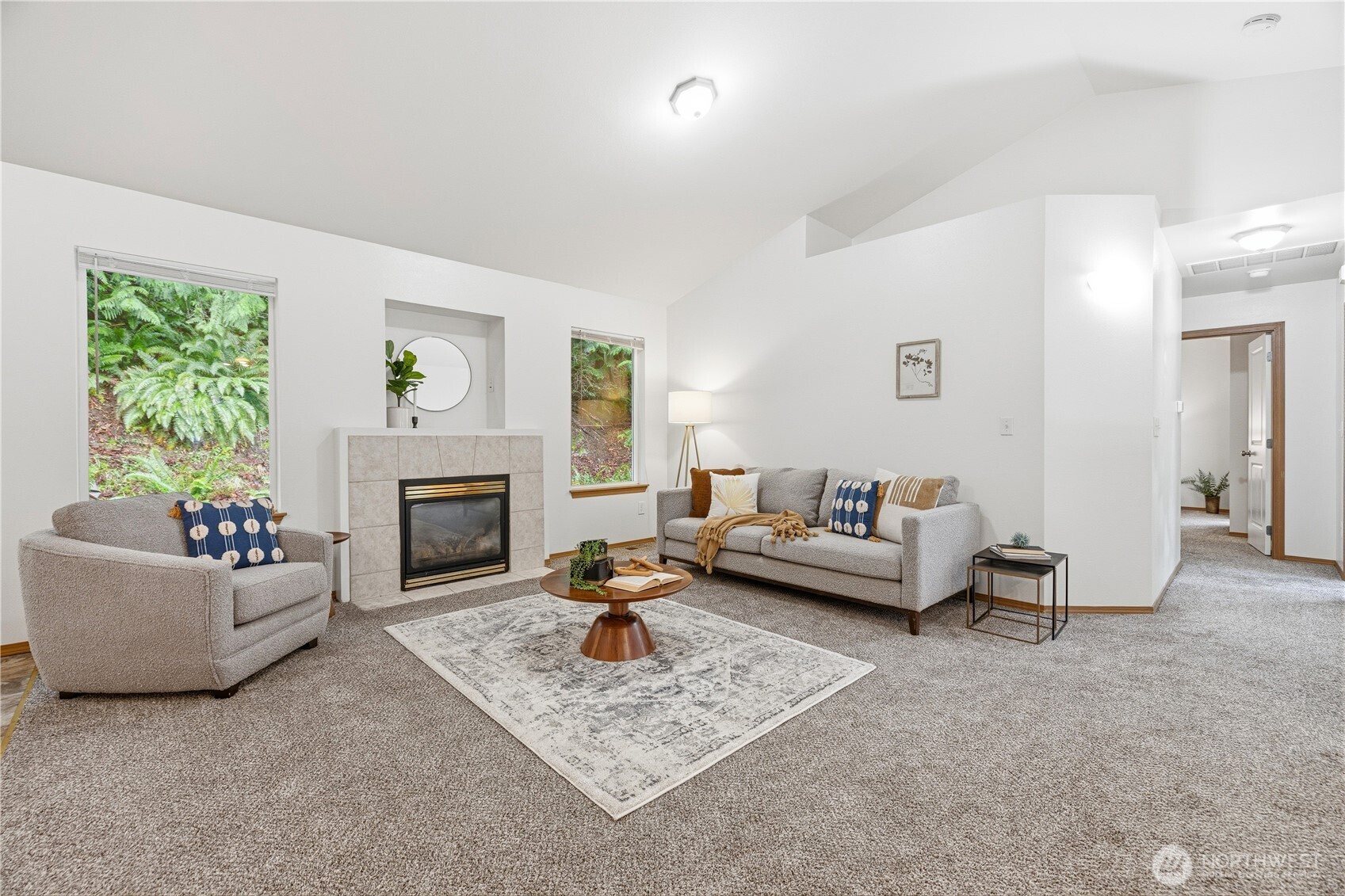 39 Sudden Valley Drive Bellingham, WA 98229 - Photo 2 of 40 a living room with furniture and a fireplace