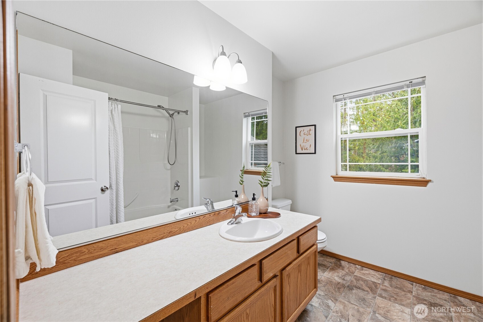 39 Sudden Valley Drive Bellingham, WA 98229 - Photo 22 of 40 a bathroom with a sink and a mirror