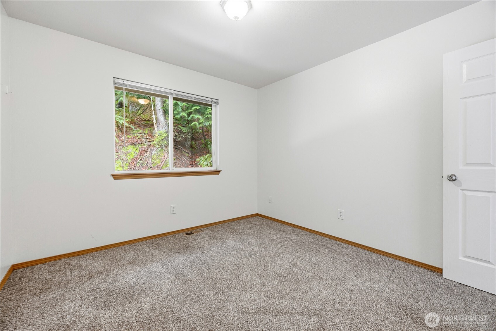 39 Sudden Valley Drive Bellingham, WA 98229 - Photo 32 of 40 an empty room with a window